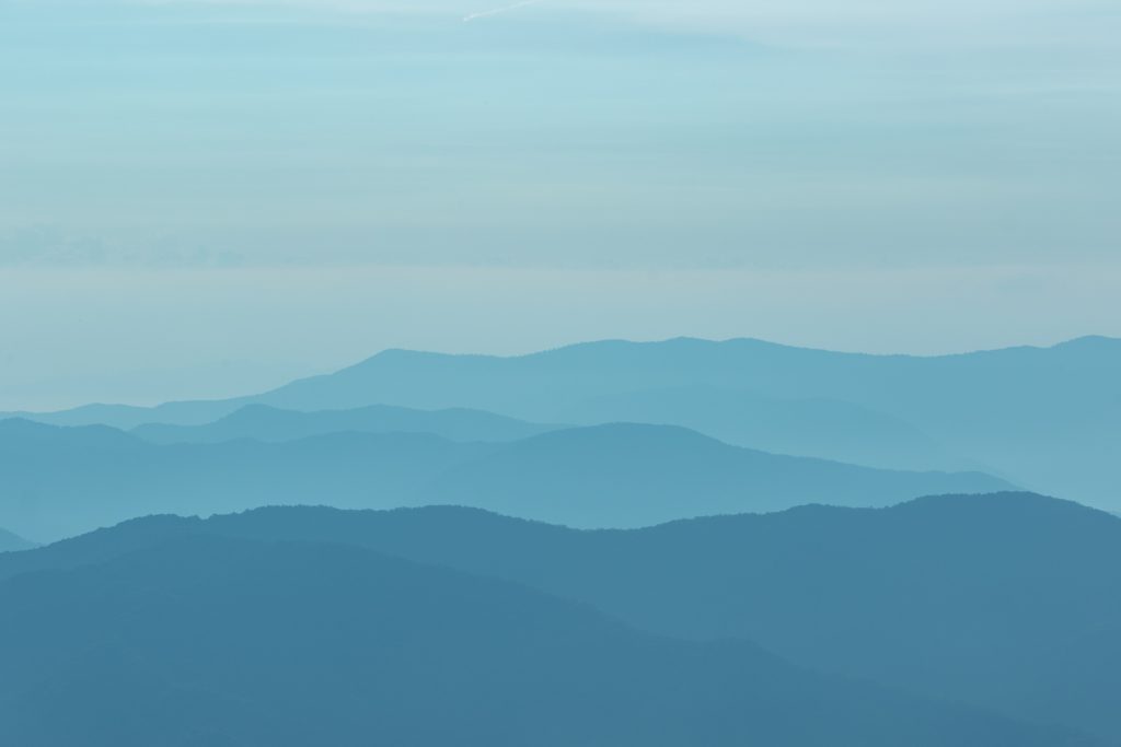 hazy blue rolling mountains